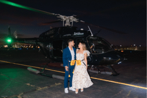 Couple boarding helicopter on proposal night